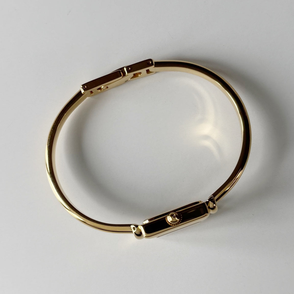Gucci 1990s Square Dial Gold Plated Bangle Watch
