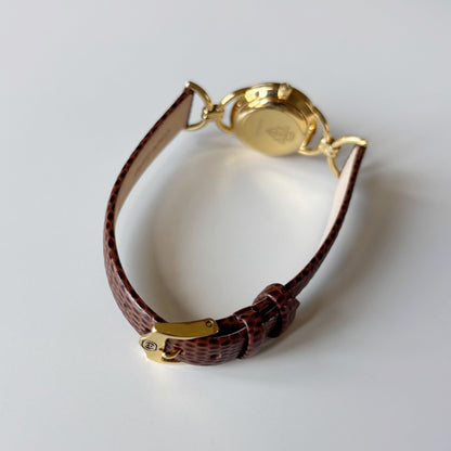 Gucci 1990s Round Dial Horsebit Gold Plated Watch