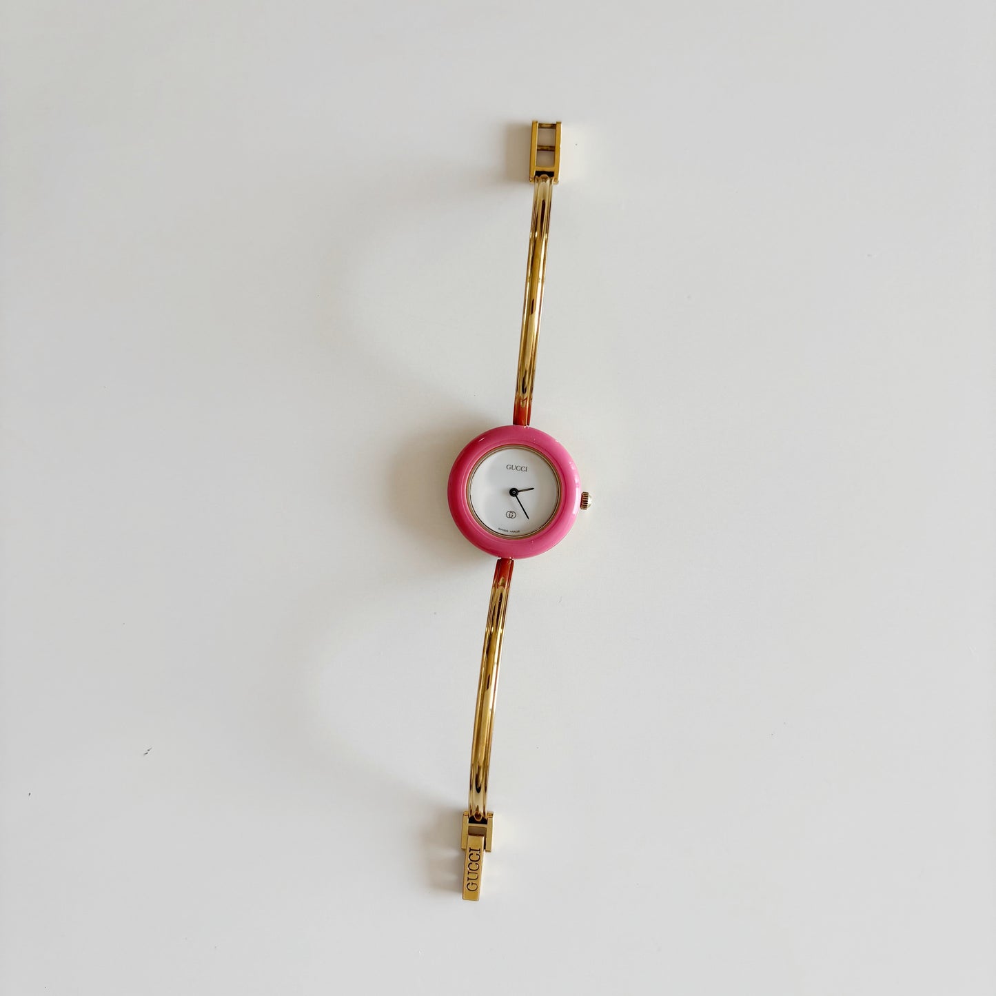 Gucci 1990s Interchangeable Bezel Gold Plated Bangle Watch with 12 bezels, case