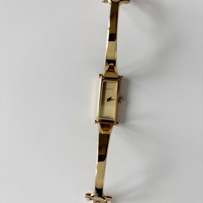 Gucci 1990s Gold Rectangular Dial Gold Plated Bangle Watch