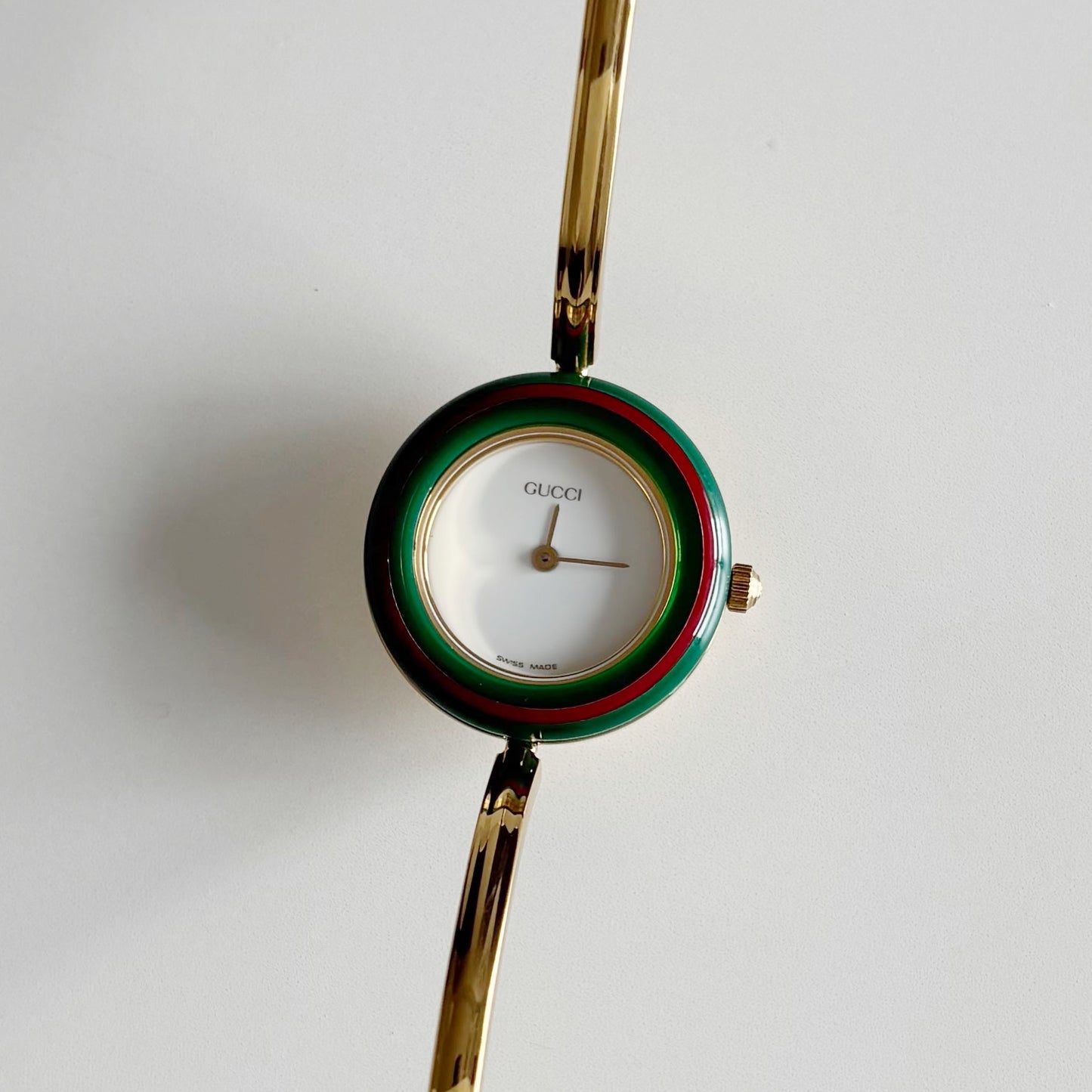 Gucci 1990s Interchangeable Bezel Gold Plated Bangle Watch with 12 bezels, case