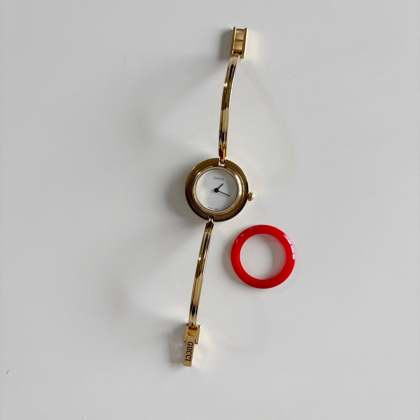 Gucci 1990s Interchangeable Bezel Gold Plated Bangle Watch with case, 12 bezels (Small)