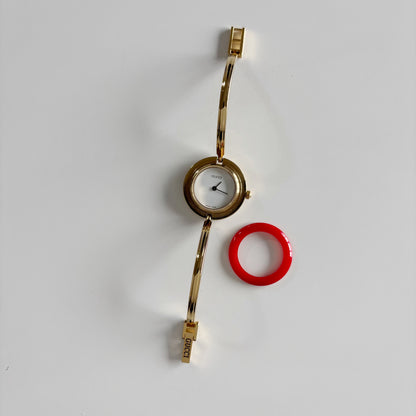 Gucci 1990s Interchangeable Bezel Gold Plated Bangle Watch with case, 12 bezels (Small)