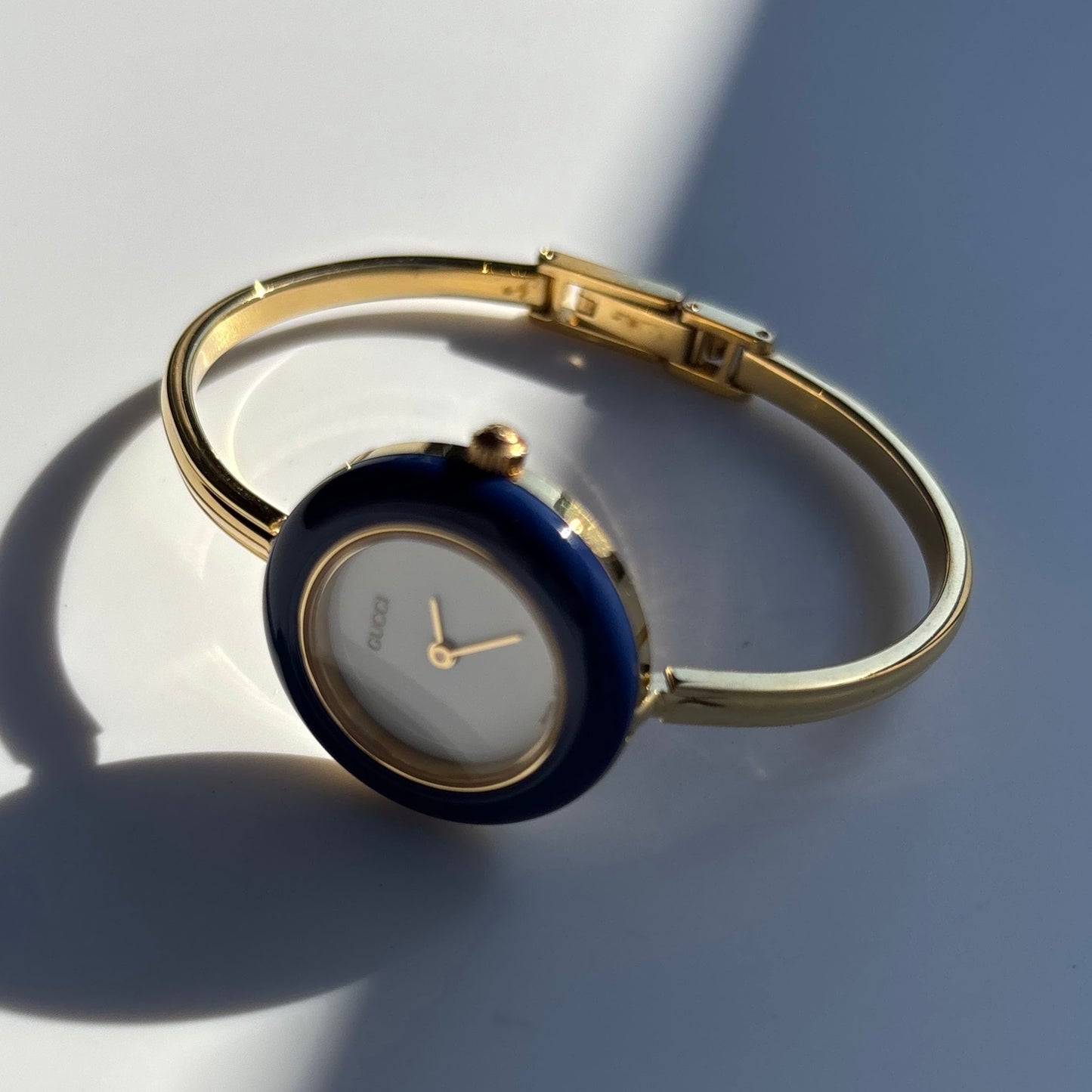 Gucci 1990s Interchangeable Bezel Gold Plated Bangle Watch with 12 bezels, case