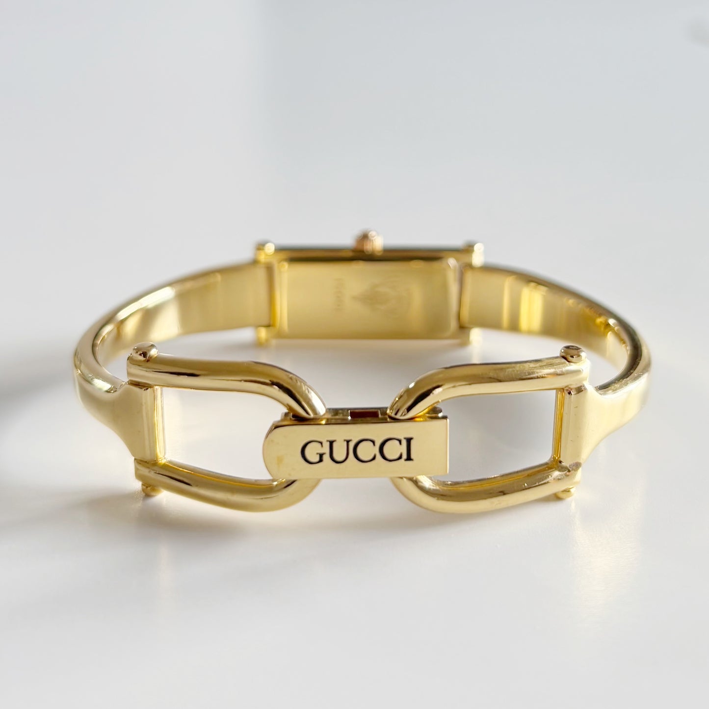 Gucci 1990s Gold Rectangular Dial Gold Plated Bangle Watch