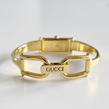 Gucci 1990s Gold Rectangular Dial Gold Plated Bangle Watch