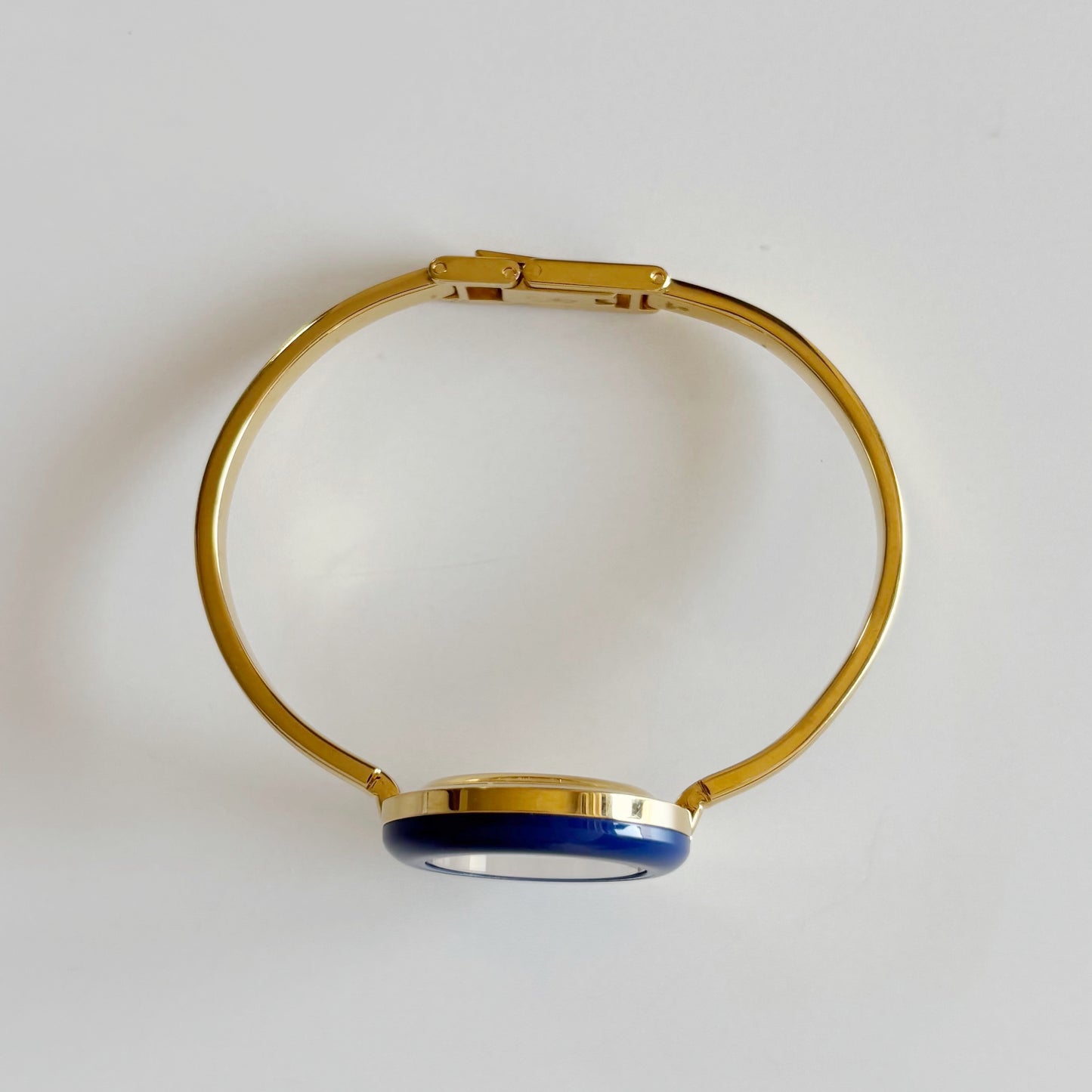 Gucci 1990s Interchangeable Bezel Gold Plated Bangle Watch with 12 bezels, case