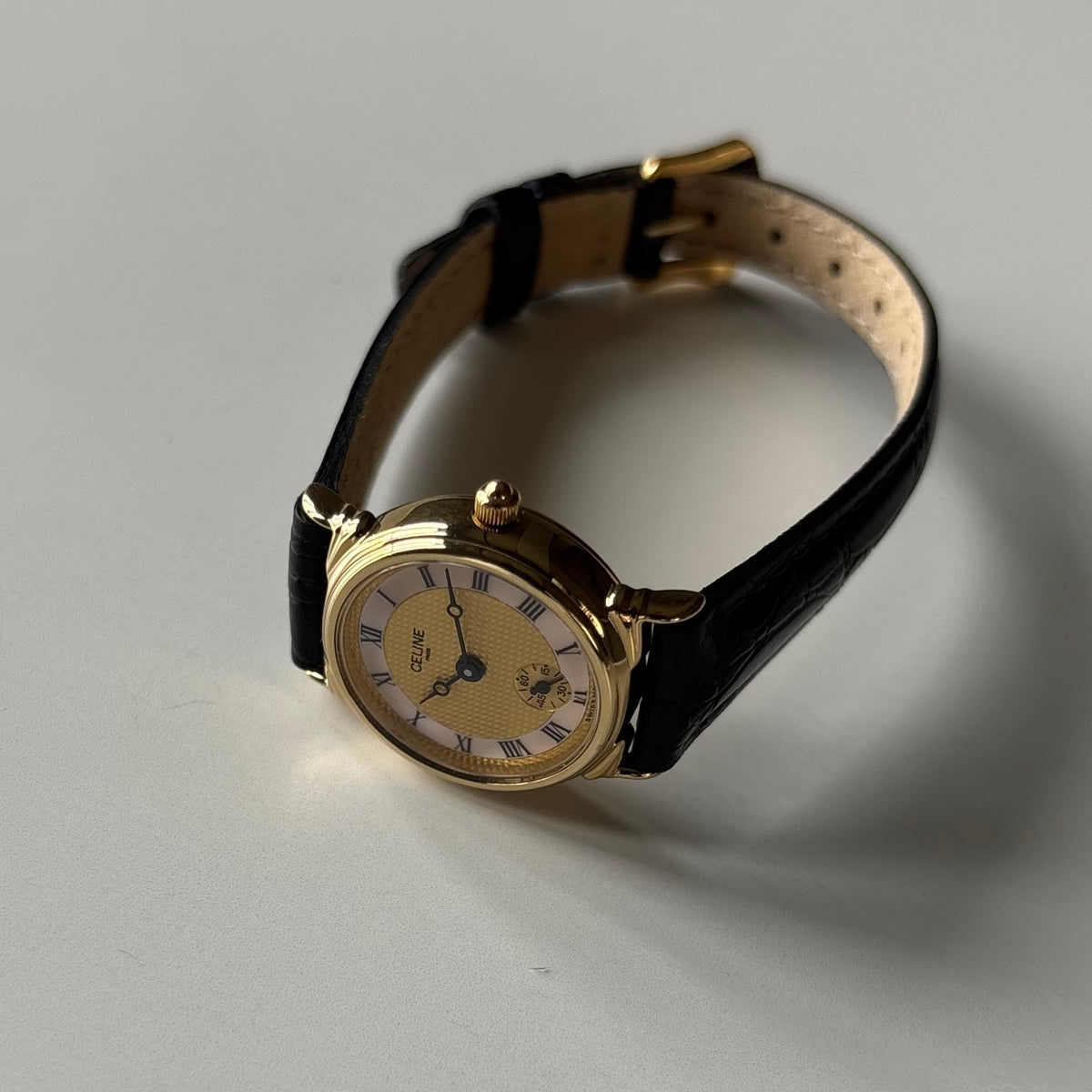 Celine 1980s Seashell Round Dial Gold Plated Watch