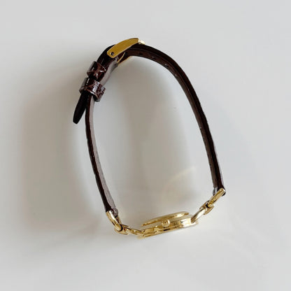 Gucci 1990s Gold Round Dial Horsebit Gold Plated Watch