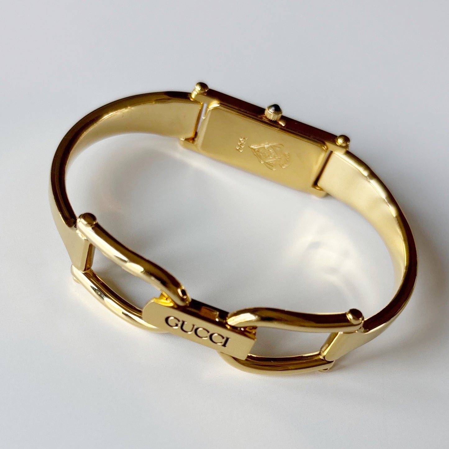 Gucci 1990s Black Dial Gold Plated Bangle Watch