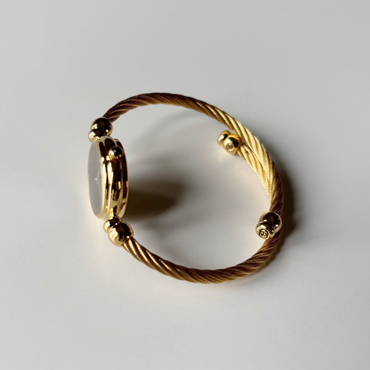 Gucci 1990s Black Dial Gold Plated Cable Bangle Watch