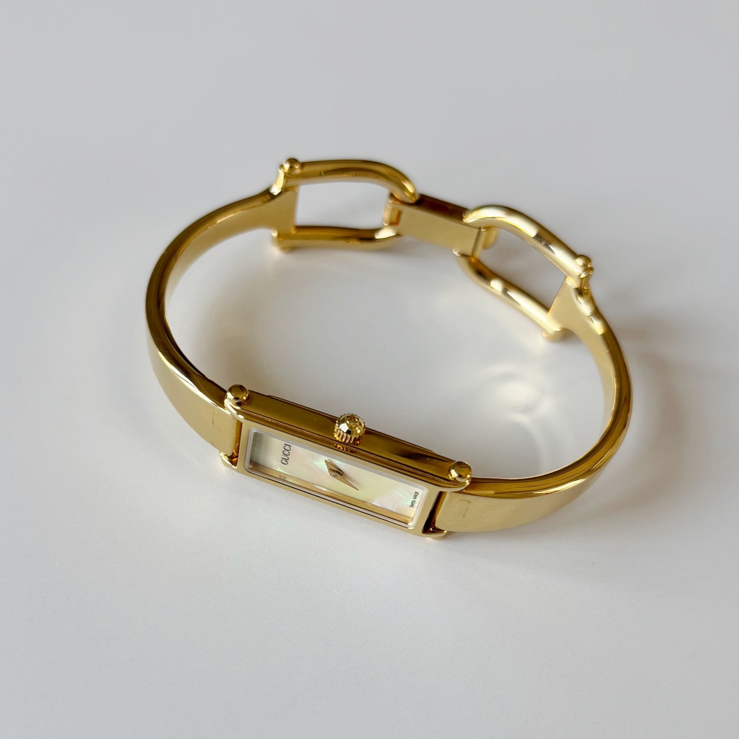 Gucci 1990s Seashell Rectangular Dial Gold Plated Bangle Watch