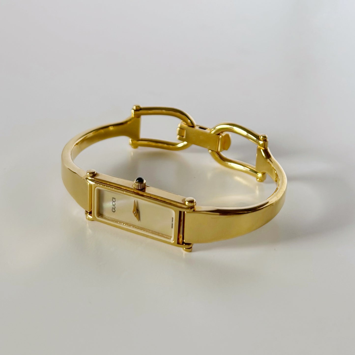 Gucci 1990s Rectangular Seashell Dial Gold Plated Bangle Watch