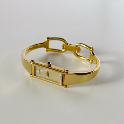 Gucci 1990s Rectangular Seashell Dial Gold Plated Bangle Watch