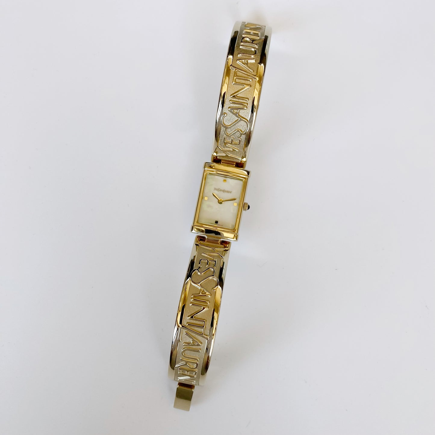 Yves Saint Laurent 1990s Seashell Dial Gold Plated Bangle Watch