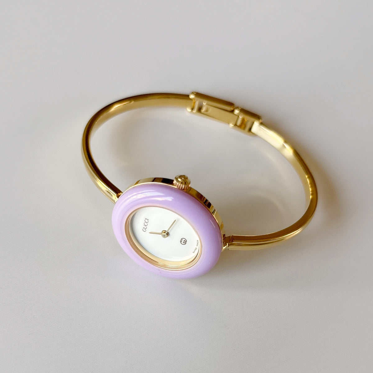 Gucci 1990s Interchangeable Bezel Gold Plated Bangle Watch with 12 bezels, case