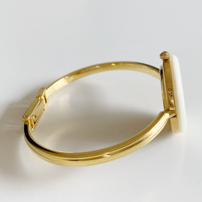 Gucci 1990s Interchangeable Bezel Gold Plated Bangle Watch with 12 bezels, case
