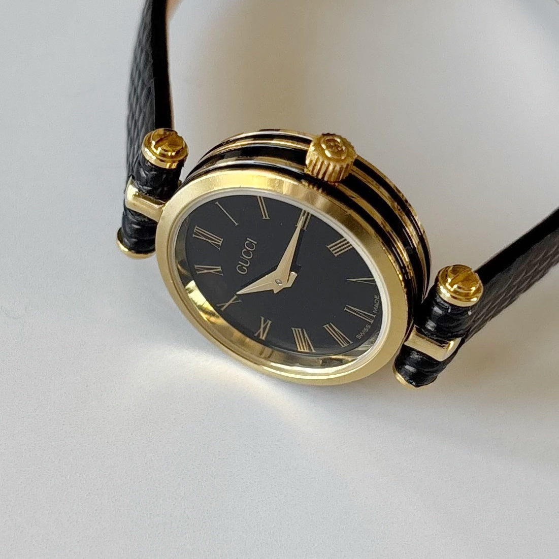 Gucci 1990s Black Round Dial Gold Plated Watch