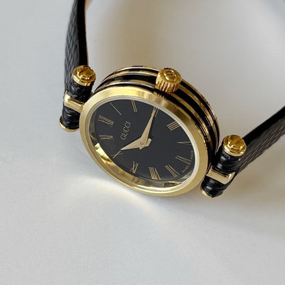 Gucci 1990s Black Round Dial Gold Plated Watch