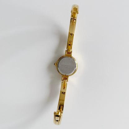 Yves Saint Laurent Seashell Dial Gold Plated Bangle Watch