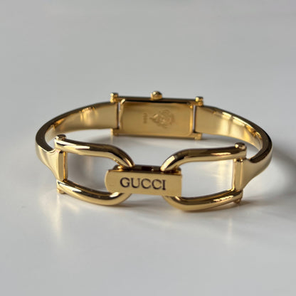 Gucci 1990s Gold Rectangular Dial Gold Plated Bangle Watch