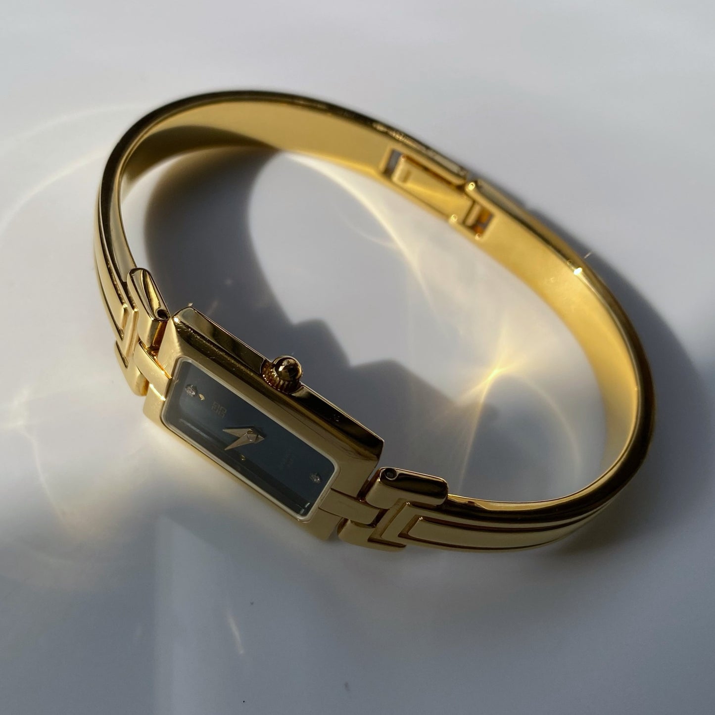 Givenchy 1990s Gold Plated Bangle Watch