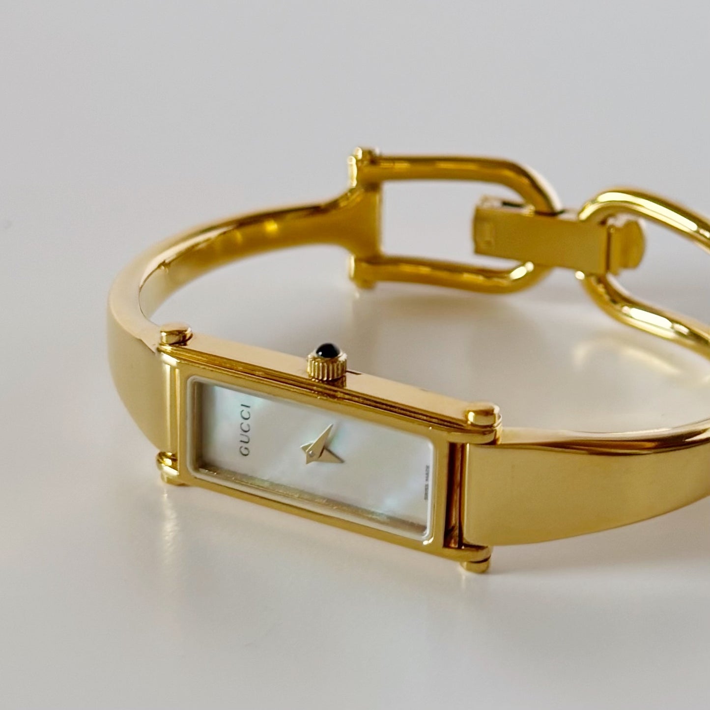 Gucci 1990s Seashell Rectangular Dial Gold Plated Bangle Watch