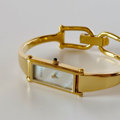 Gucci 1990s Seashell Rectangular Dial Gold Plated Bangle Watch