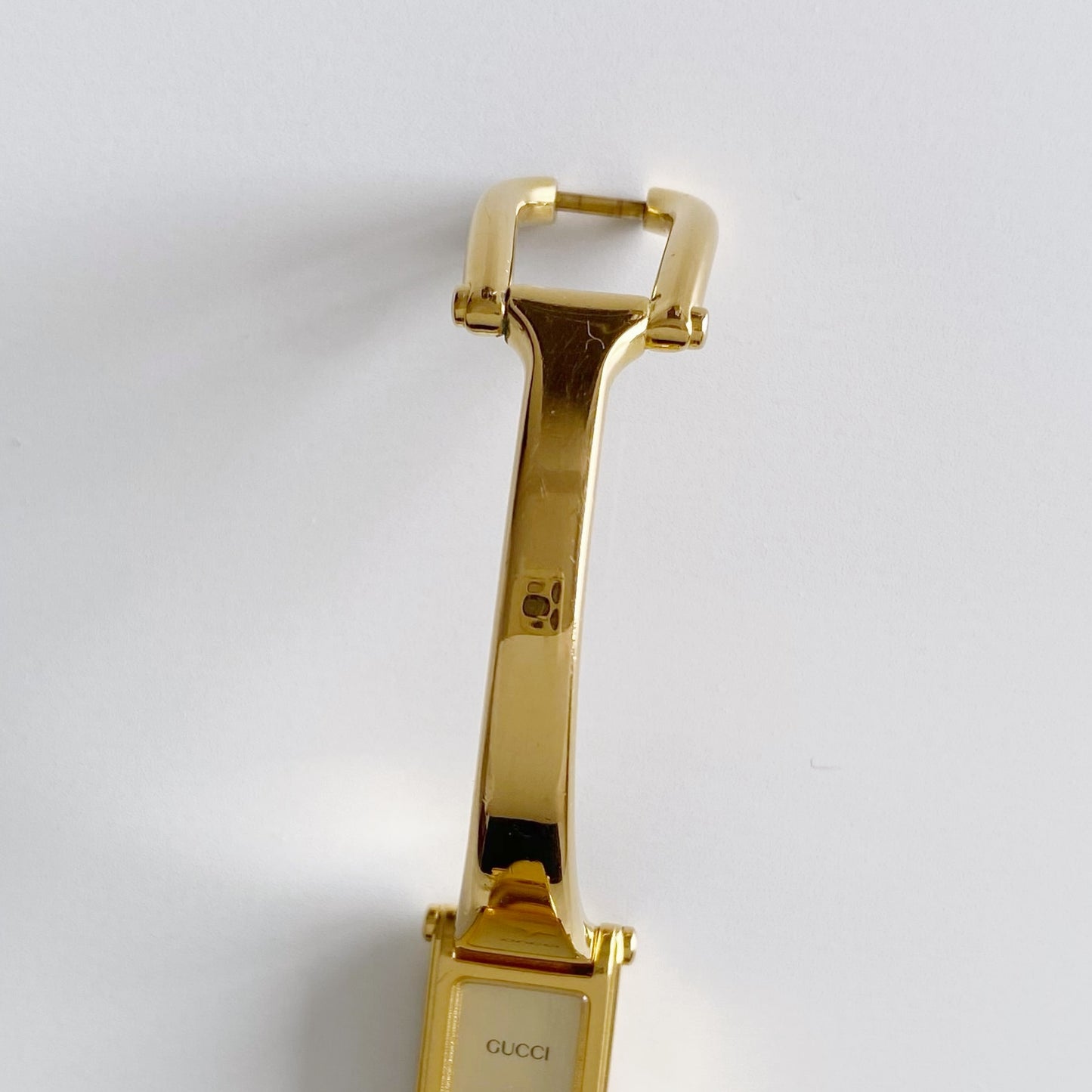 Gucci 1990s Gold Dial Rectangular  Gold Plated Bangle Watch