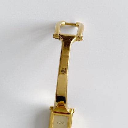Gucci 1990s Gold Dial Rectangular  Gold Plated Bangle Watch