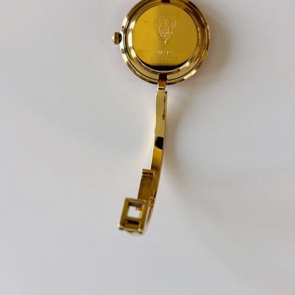 Gucci 1990s Interchangeable Bezel Gold Plated Bangle Watch with 12 bezels, case