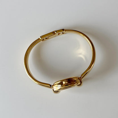 Gucci 1990s Round Dial Gold Plated Bangle Watch