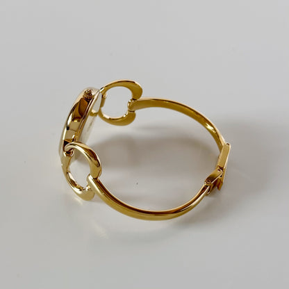 Gucci 1990s Seashell Oval Dial Gold-Plated Bangle Watch (Small)