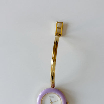 Gucci 1990s Interchangeable Bezel Gold Plated Bangle Watch with 12 bezels, case