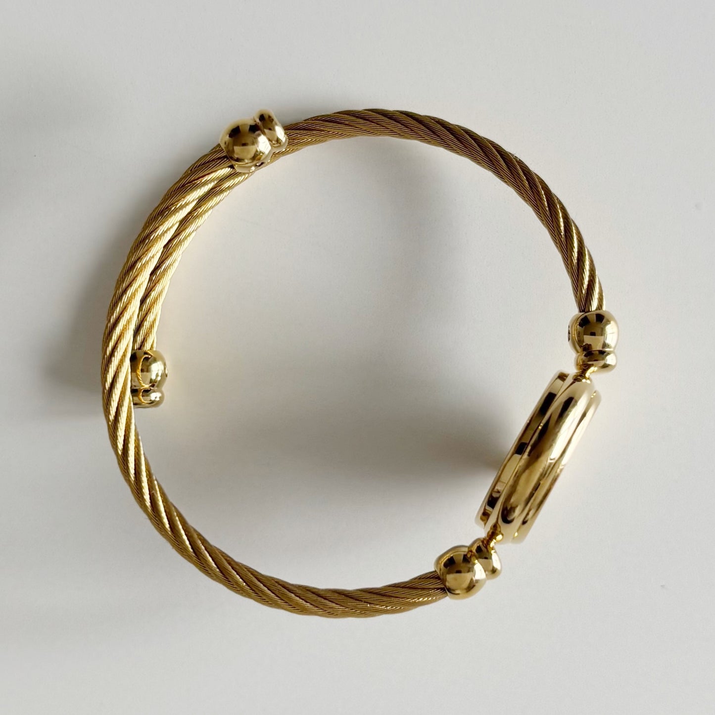 Gucci 1990s Black Dial Gold Plated Cable Bangle Watch