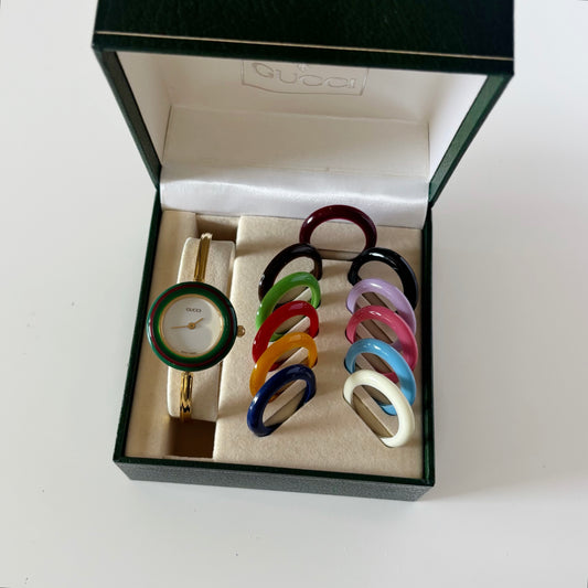 Gucci 1990s Interchangeable Bezel Gold Plated Bangle Watch with 12 bezels, case