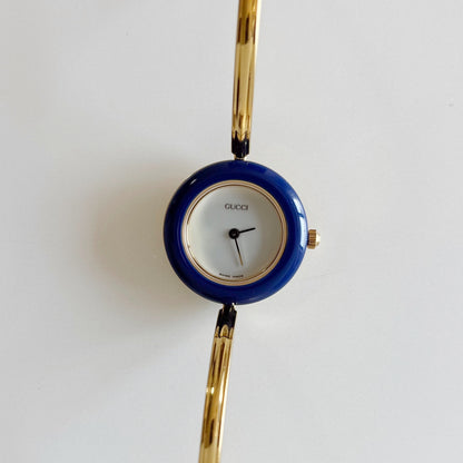 Gucci 1990s Interchangeable Bezel Gold Plated Bangle Watch with 12 bezels, case