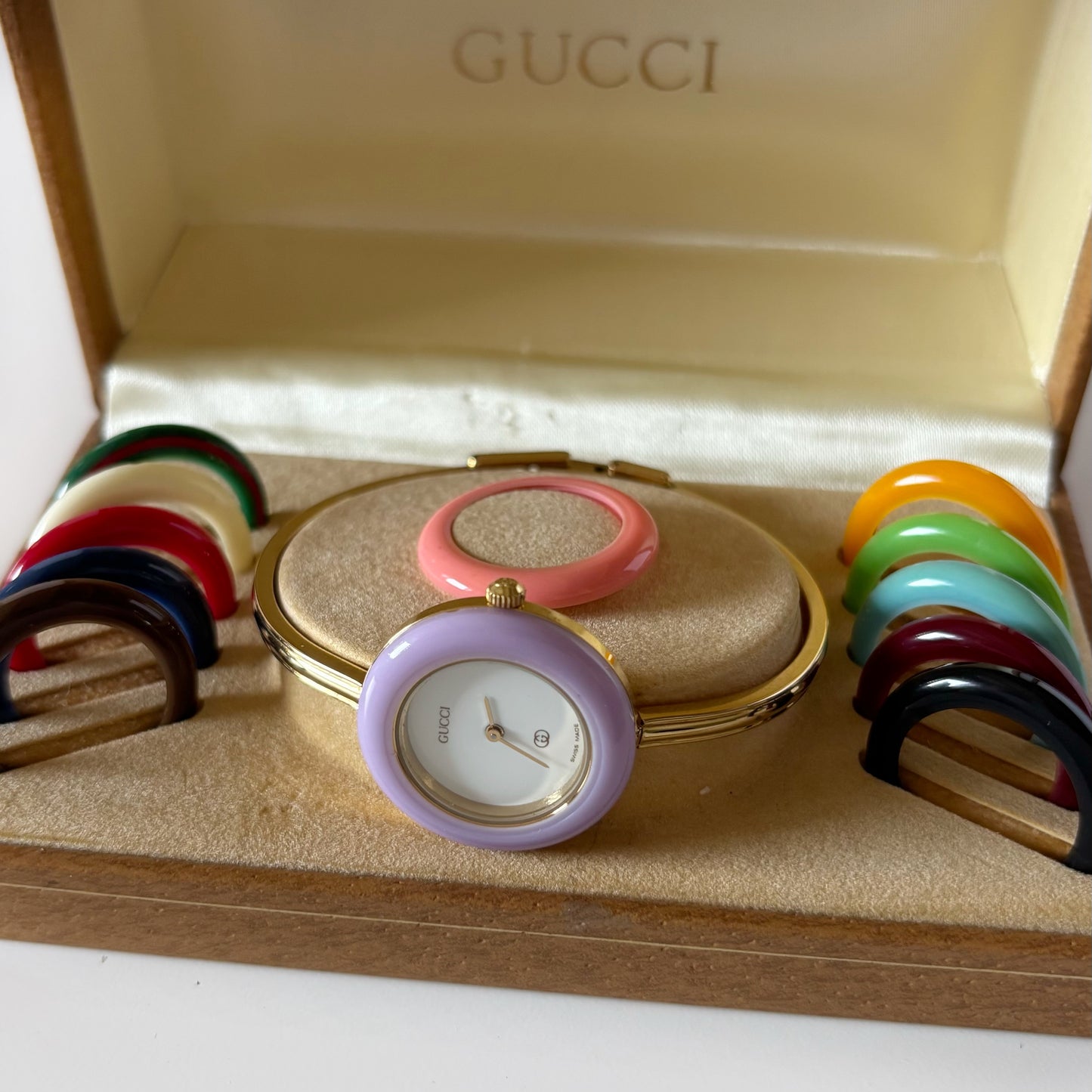 Gucci 1990s Interchangeable Bezel Gold Plated Bangle Watch with 12 bezels, case