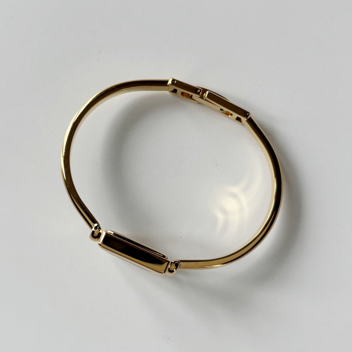 Gucci 1990s Square Dial Gold Plated Bangle Watch