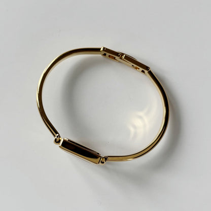 Gucci 1990s Square Dial Gold Plated Bangle Watch