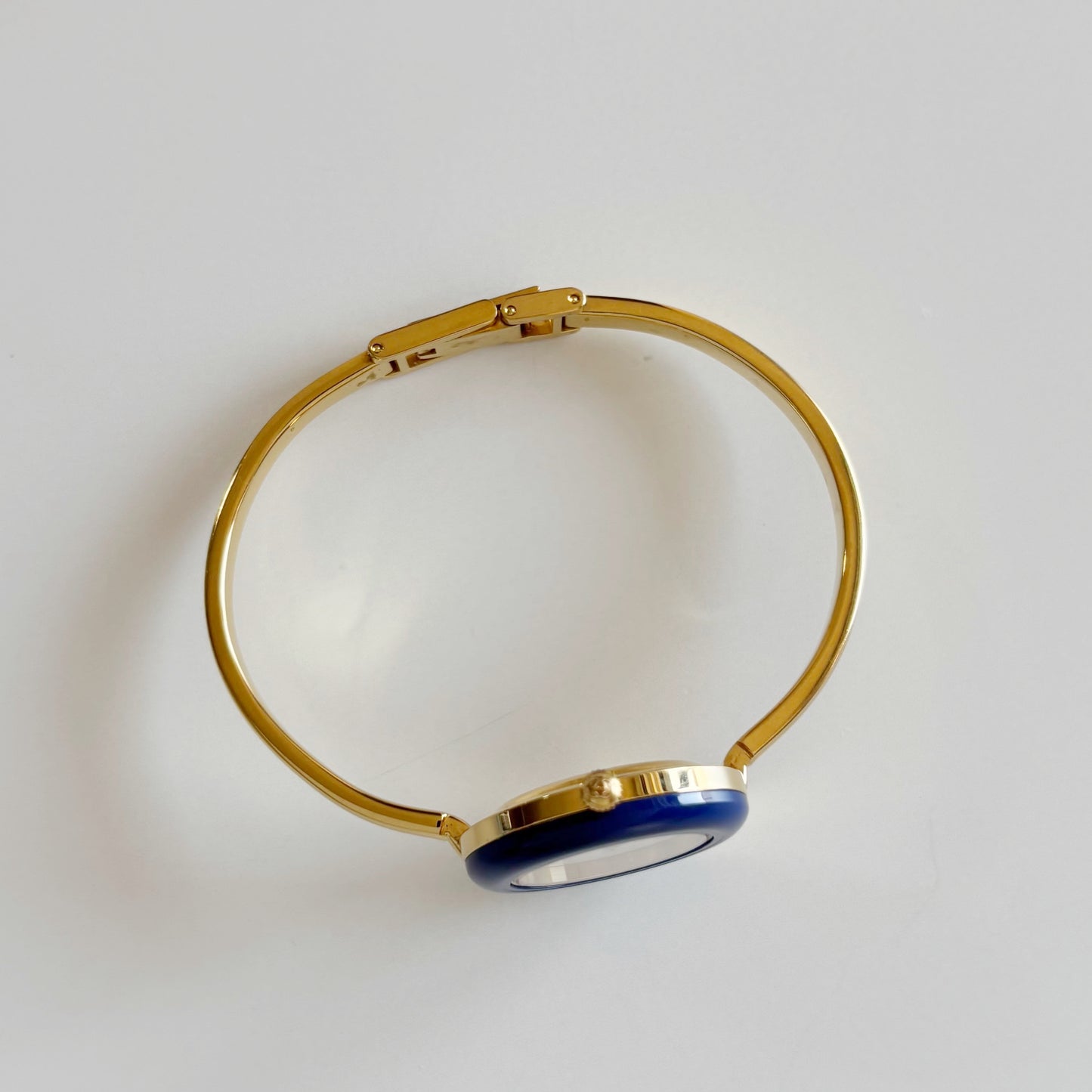 Gucci 1990s Interchangeable Bezel Gold Plated Bangle Watch with 12 bezels, case