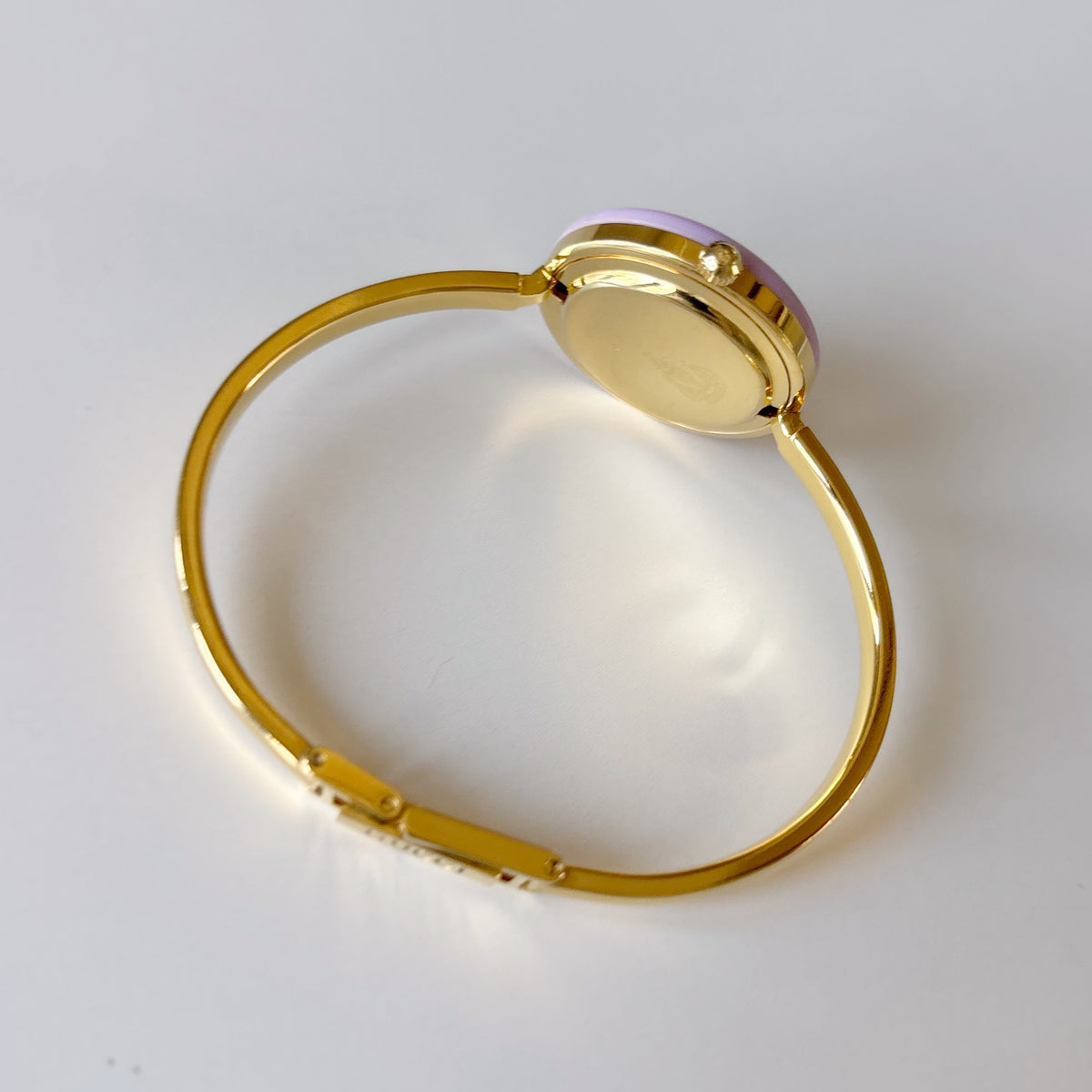 Gucci 1990s Interchangeable Bezel Gold Plated Bangle Watch with 12 bezels, case