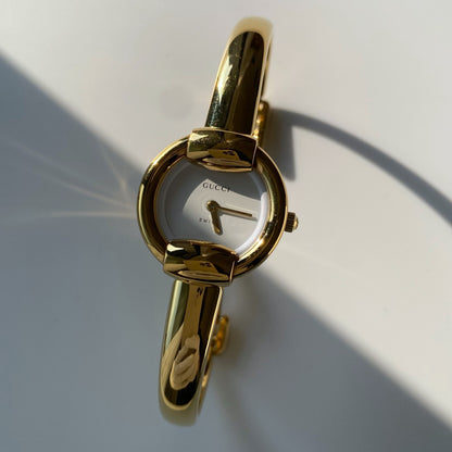 Gucci 1990s Round Dial Gold Plated Bangle Watch