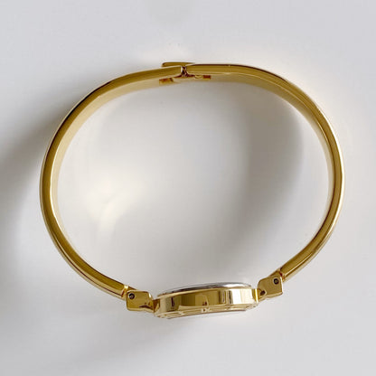 Yves Saint Laurent Seashell Dial Gold Plated Bangle Watch