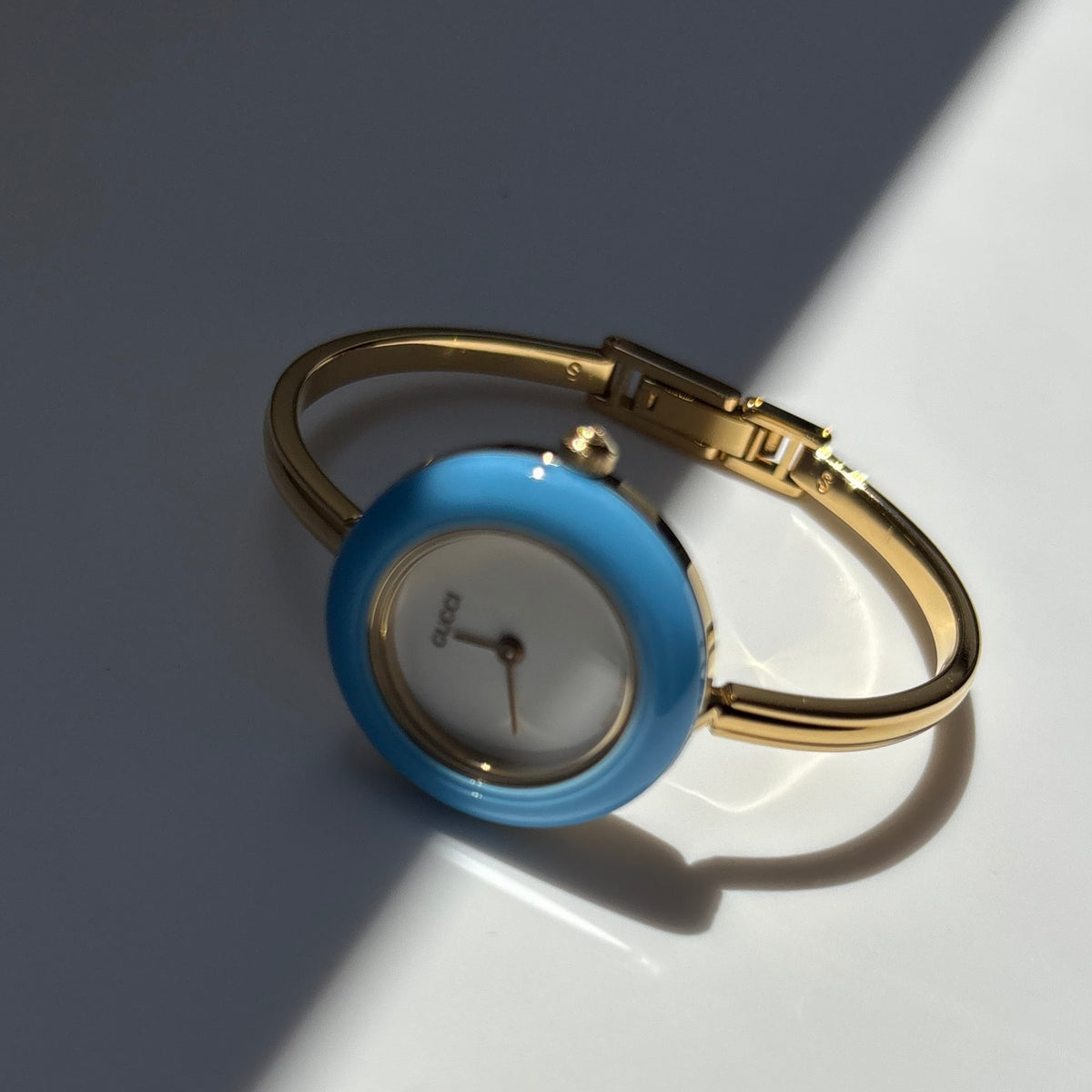 Gucci 1990s Interchangeable Bezel Gold Plated Bangle Watch with 12 bezels, case (Small)