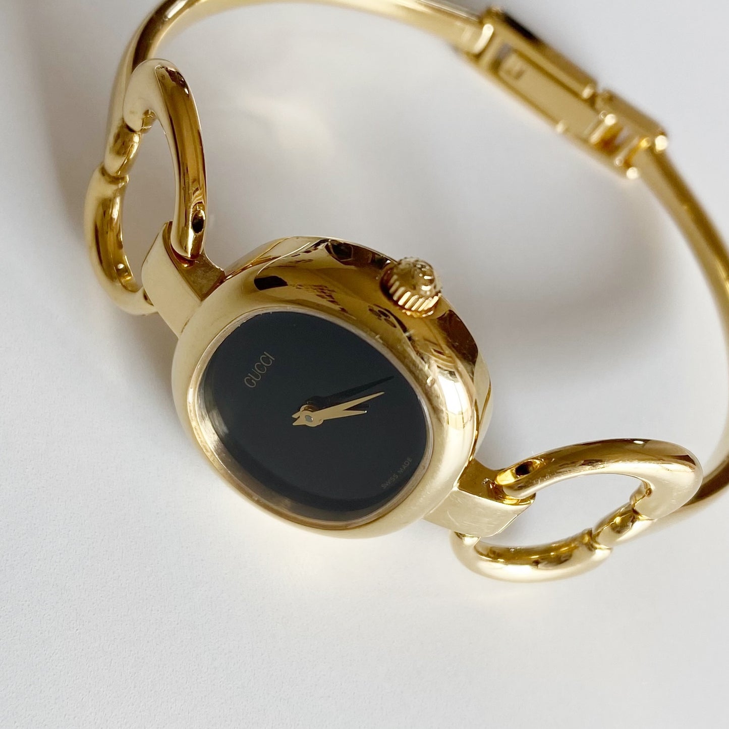 Gucci 1990s Black Dial Gold Plated Bangle Watch