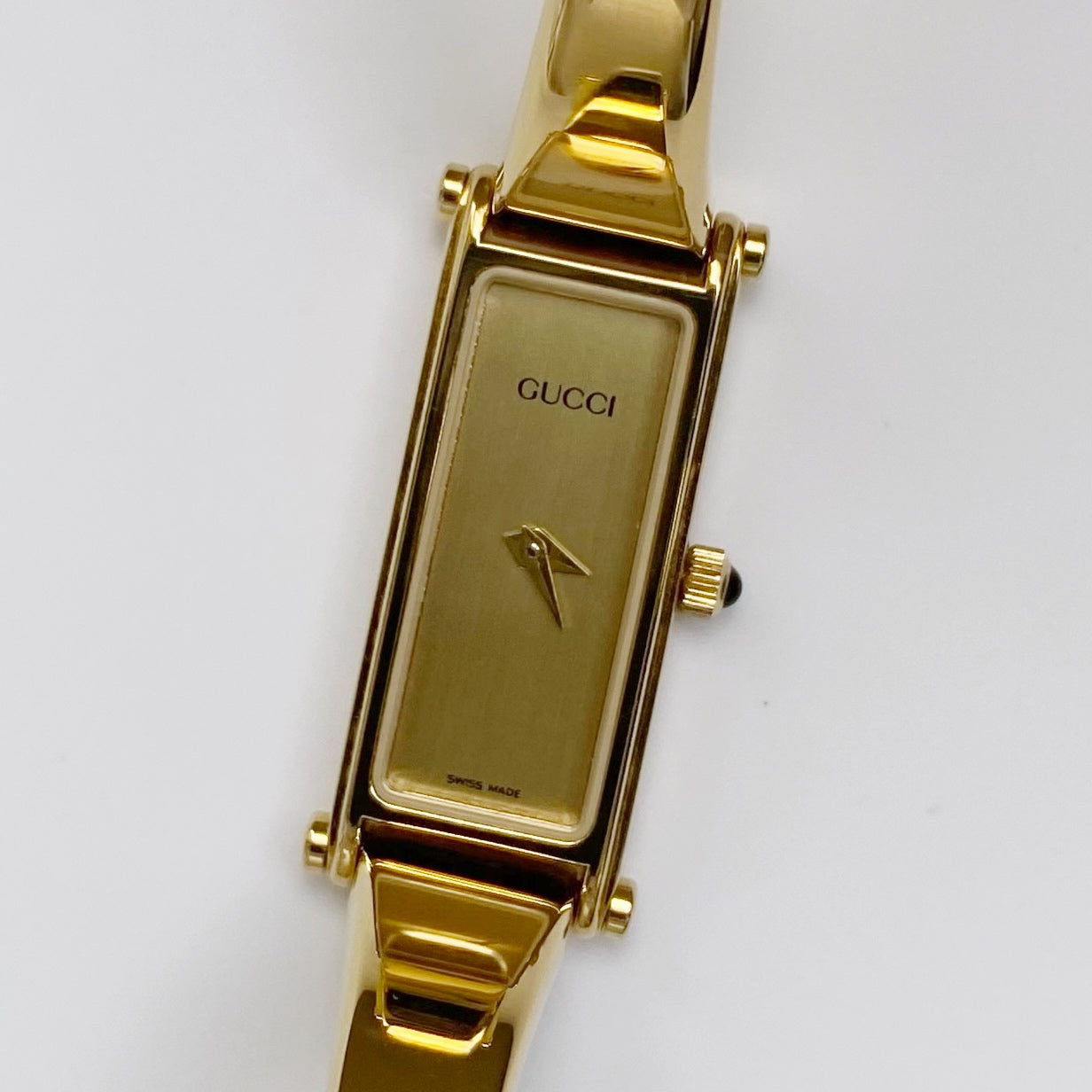 Gucci 1990s Rectangular Gold Dial Gold Plated Bangle Watch (Small)