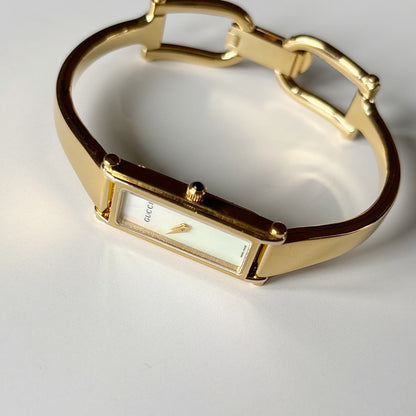 Gucci 1990s Seashell Dial Rectangular Gold-Plated Bangle Watch