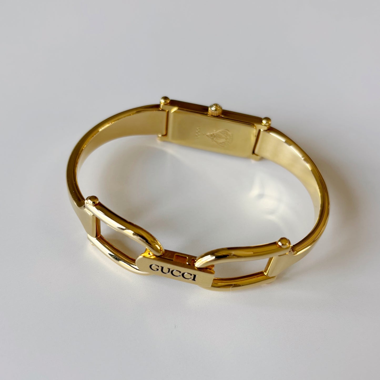 Gucci 1990s Seashell Rectangular Dial Gold Plated Bangle Watch