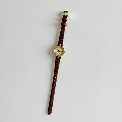 Gucci 1990s Round Gold Dial Gold Plated Watch